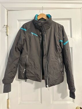Spyder Women’s Gray Ski with turquoise accents.  Size 6.